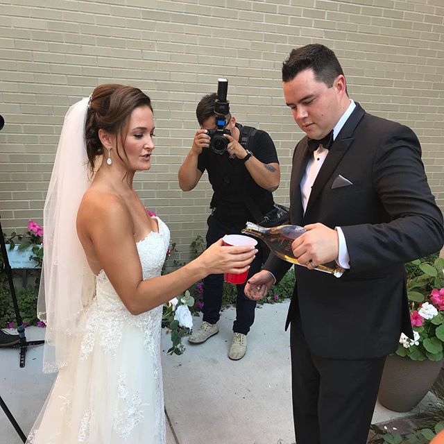 Honoring the “ancient” South African tradition of burying a bottle of bourbon outside the church on your wedding day…